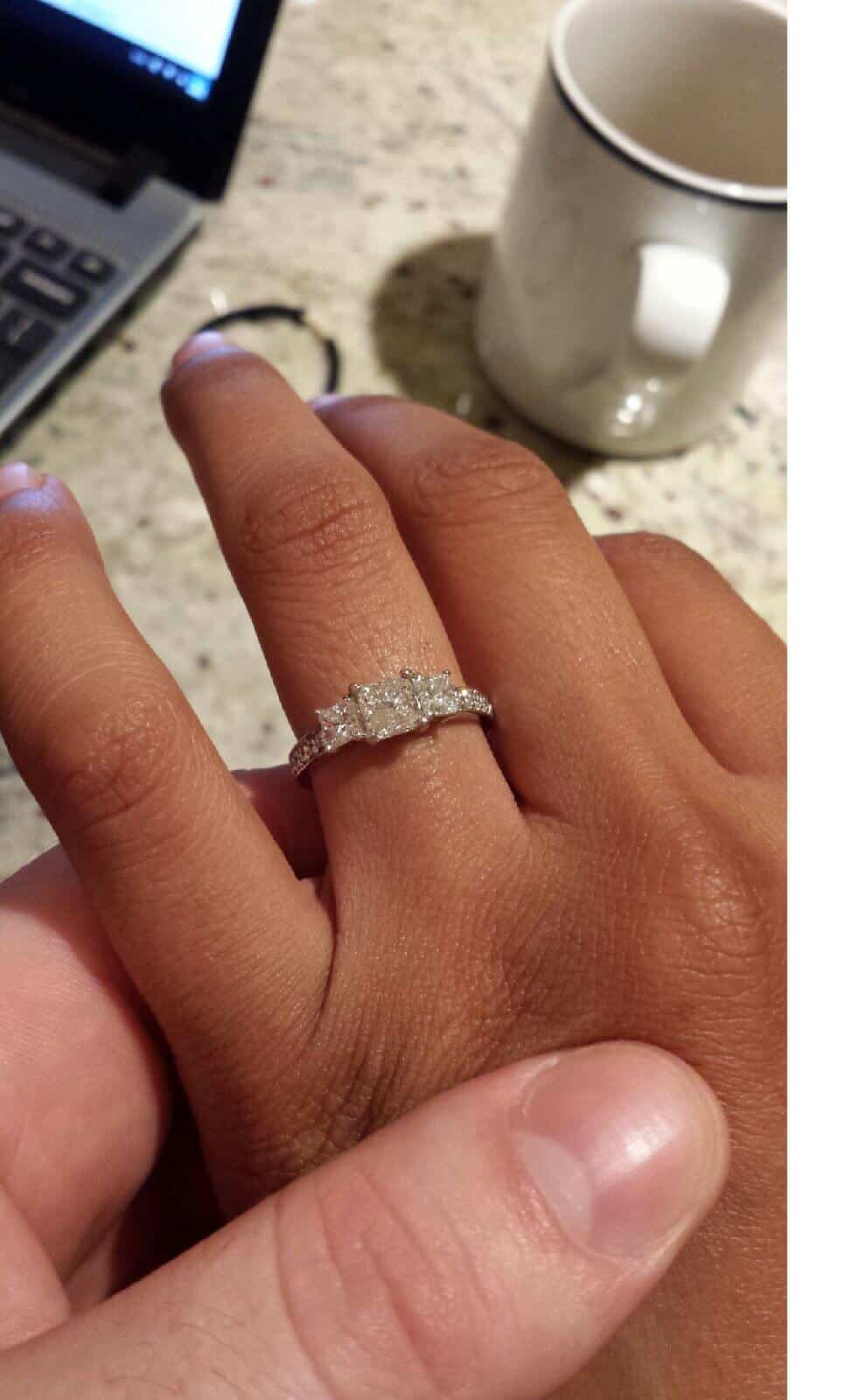 Three stone princess cut ring