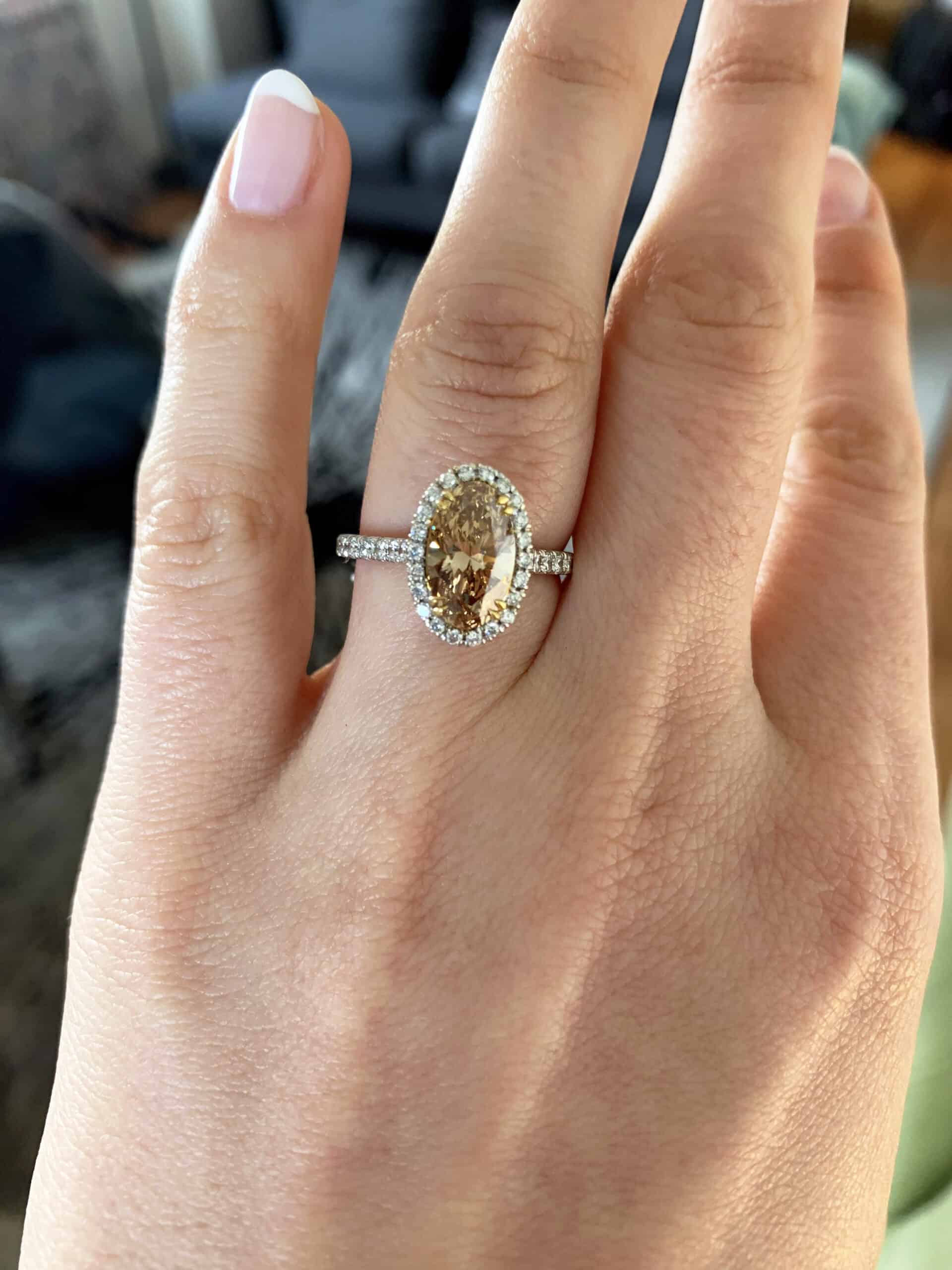 A champagne oval cut diamond 