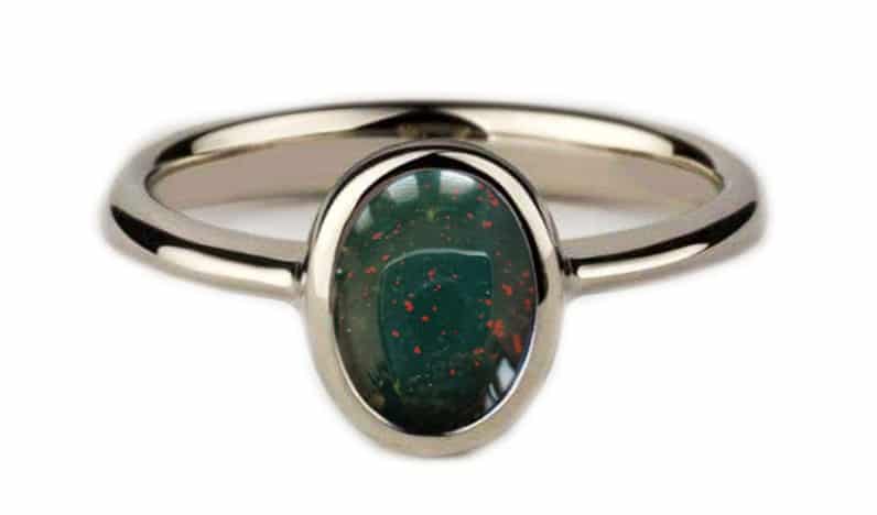 Oval bloodstone bezel ring in sterling silver