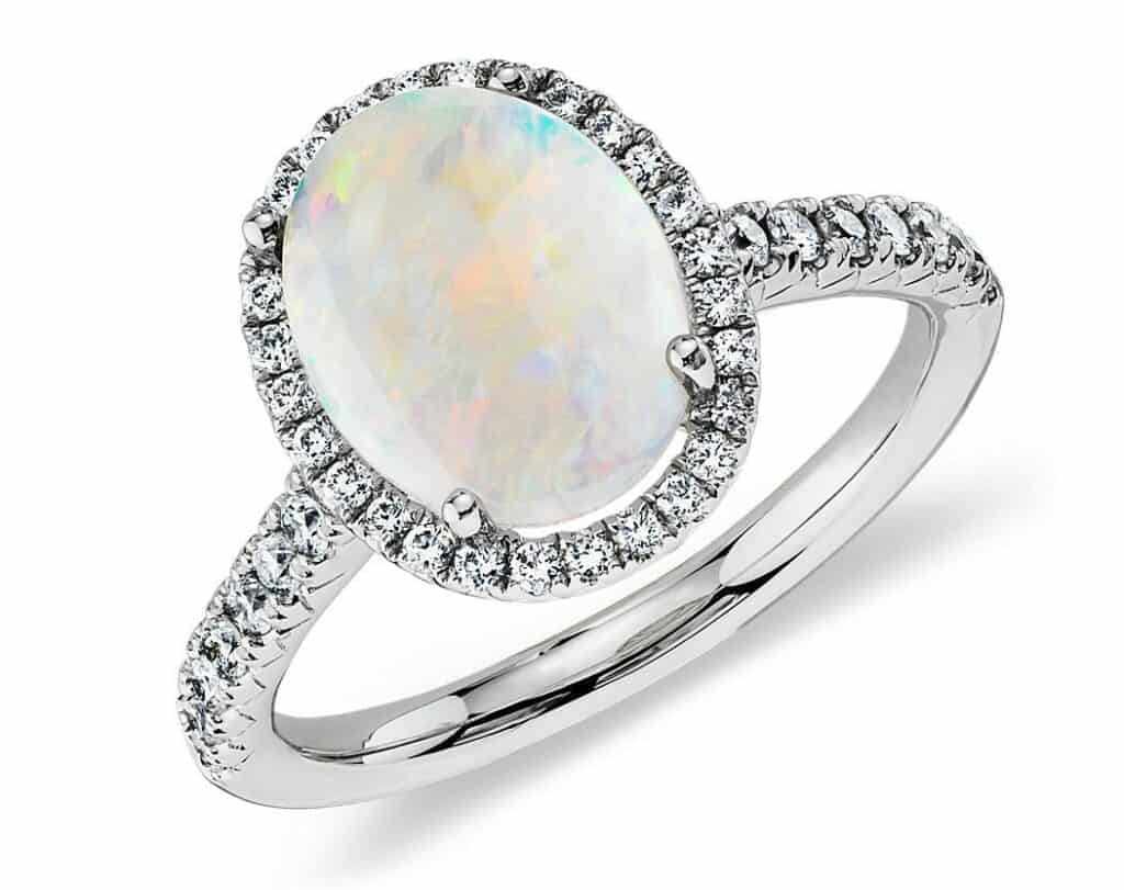 Gorgeous diamond halo with a big oval opal in the center