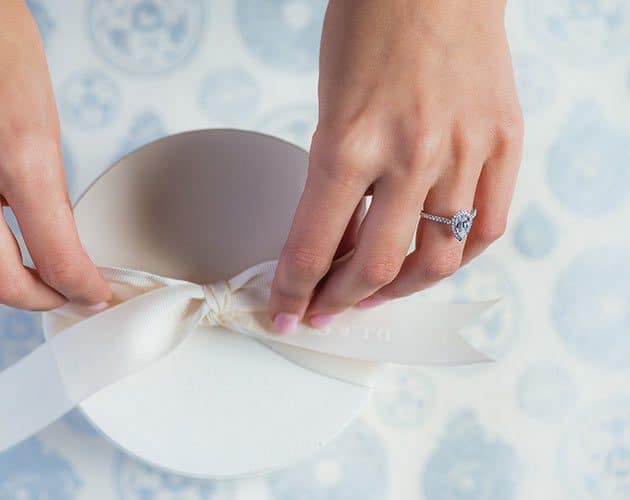 halo style teardrop engagement ring