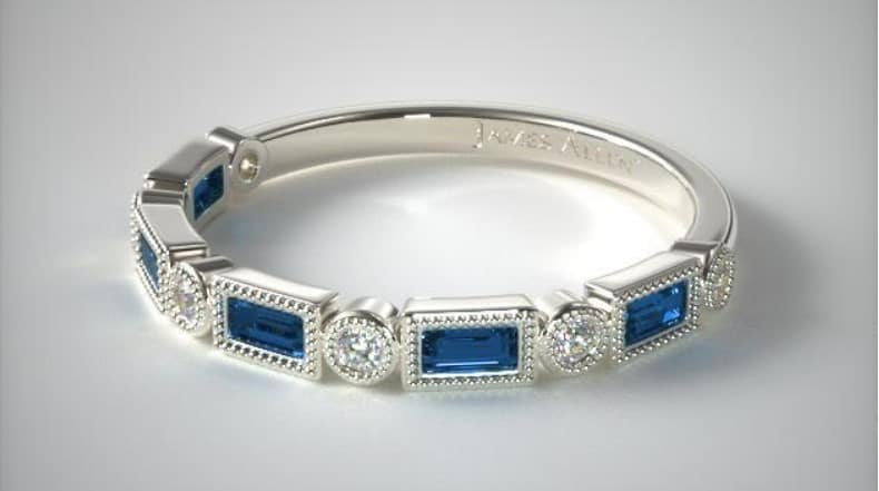 Sapphire baguette ring with diamonds